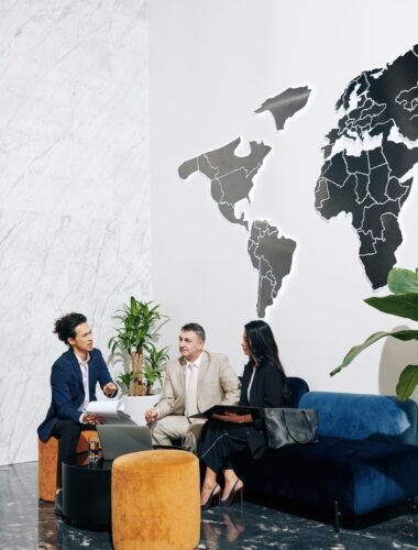 serious-entrepreneur-explaining-details-report-business-partners-meeting-modern-office